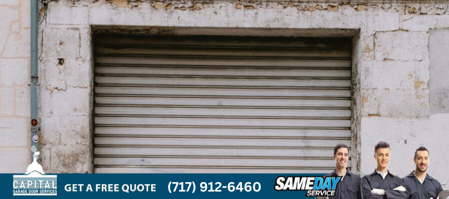 signs of damaged garage door springs